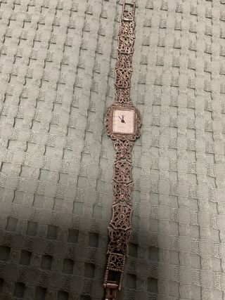 Reloj de plata envejecida