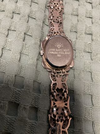 Reloj de plata envejecida