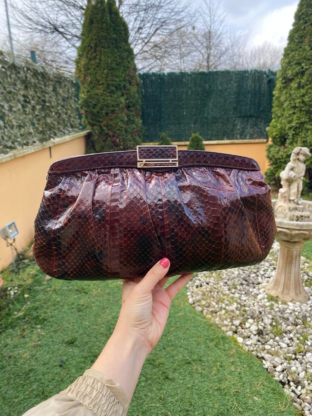 Cartera de mano de piel