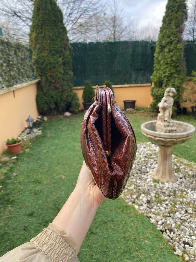 Cartera de mano de piel