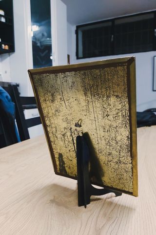 Espejo antiguo con marco de latón