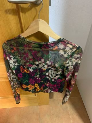 Blusa semitransparente primavera desigual