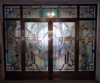 CIERRE DE ALUMINIO BRONCE CON VIDRIERAS