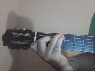 Guitarra clasica del oeste como poco 