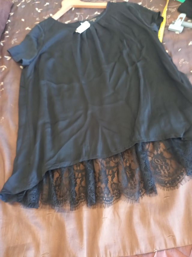 Blusa negra con etiqueta corte ingles T M