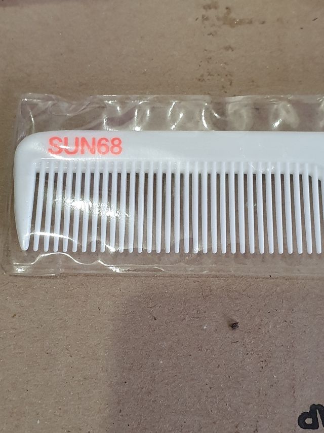 Penna e pettine da borsa Sun 68 nuovo