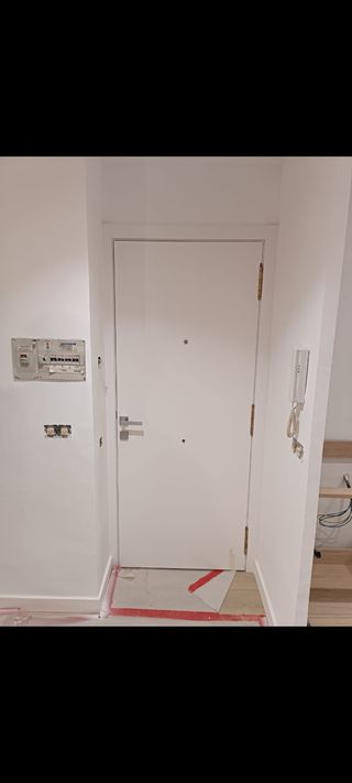 Forrar puerta de entrada