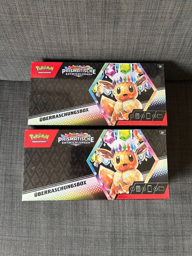 Pokémon Prismatic Evolutions Caja Sorpresa