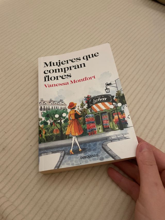 Mujeres que compran flores