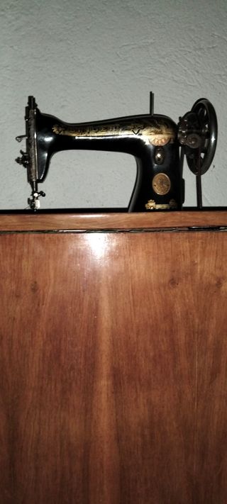 Maquina de coser singer