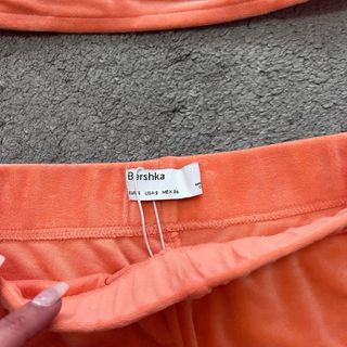 Sudadera short y top naranja