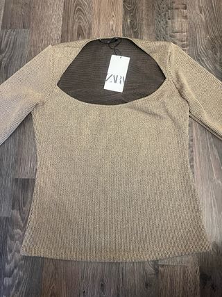 Top Zara elástico dorado talla L