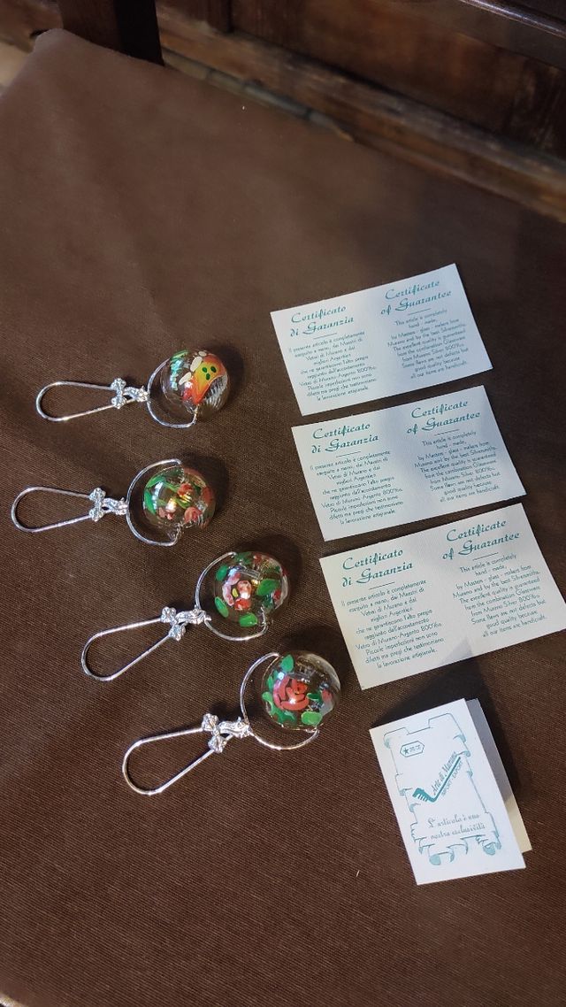 Oggetti in argento e vetro di murano