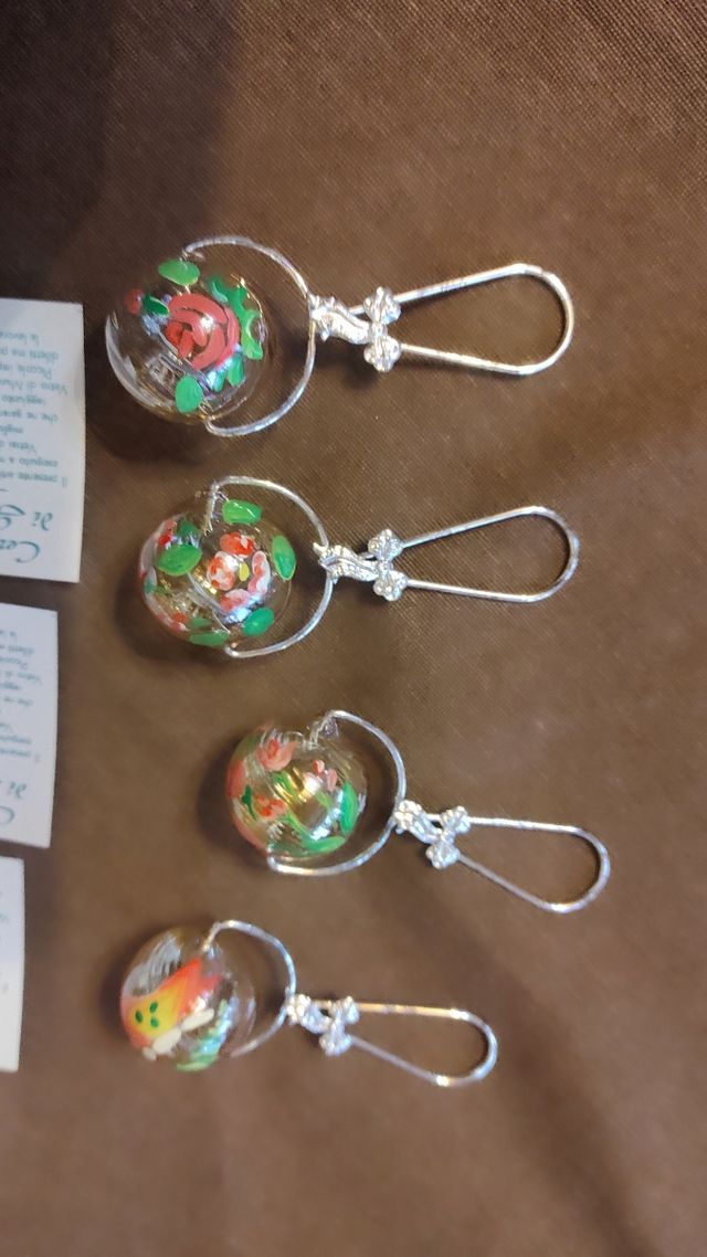 Oggetti in argento e vetro di murano