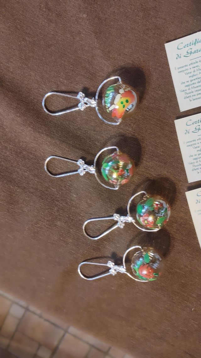 Oggetti in argento e vetro di murano