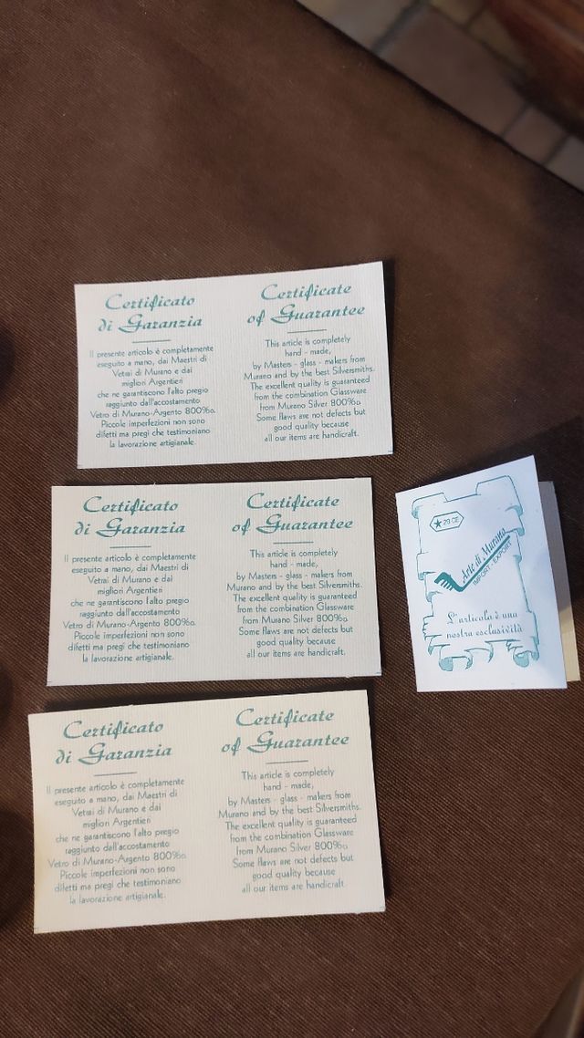 Oggetti in argento e vetro di murano