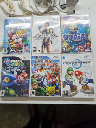 Wii, Tabla Wii Fit, mandos y 10 juegos.