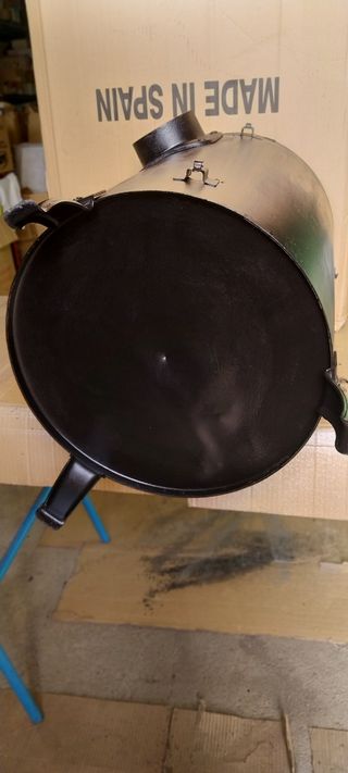 Estufa de leña marca Theca Redonda