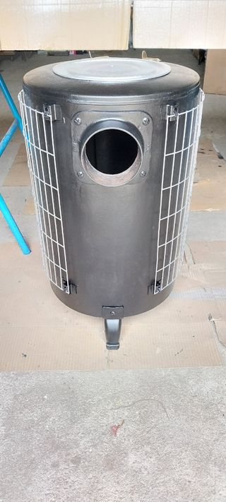 Estufa de leña marca Theca Redonda