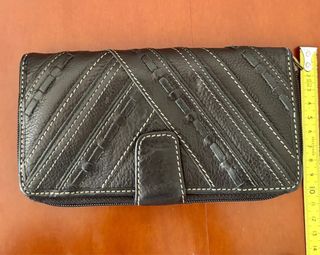 Cartera Fossil de piel negra  Elegancia y calidad