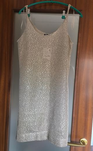 Vestido dorado transparente. Sin estrenar.