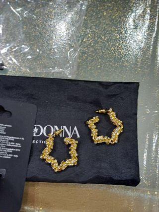 Orecchini dorate Primadonna.