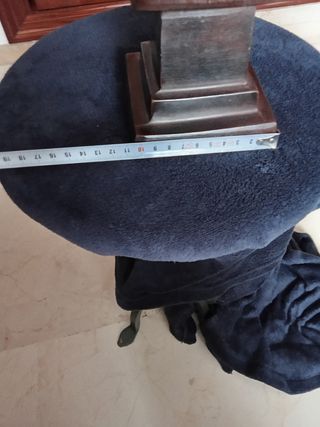 Candelabro portavelas de bronce.