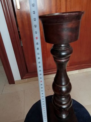 Candelabro portavelas de bronce.