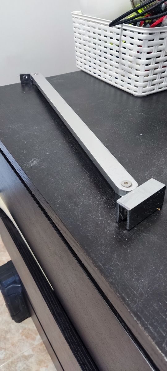 Brazo soporte mampara