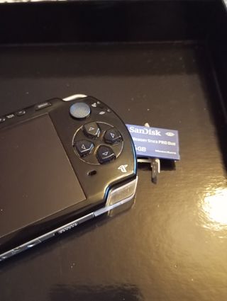 Psp consola y 2 juegos 