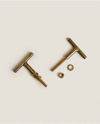 Tirador y pomo metalicos dorados Zara Home