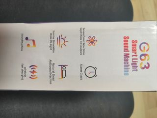 Radio reloj despertador. Cargador. Luces