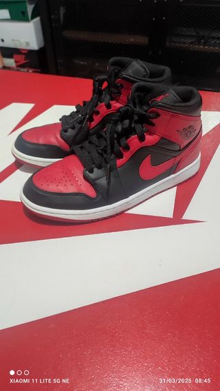 Jordan 1 mid banned 