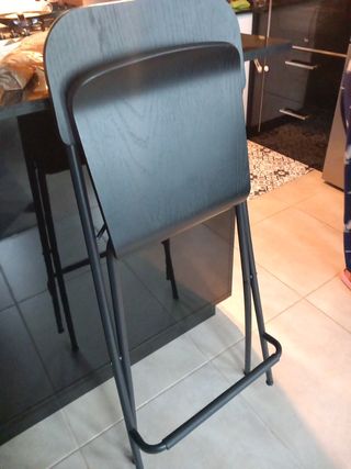 Taburetes plegables.