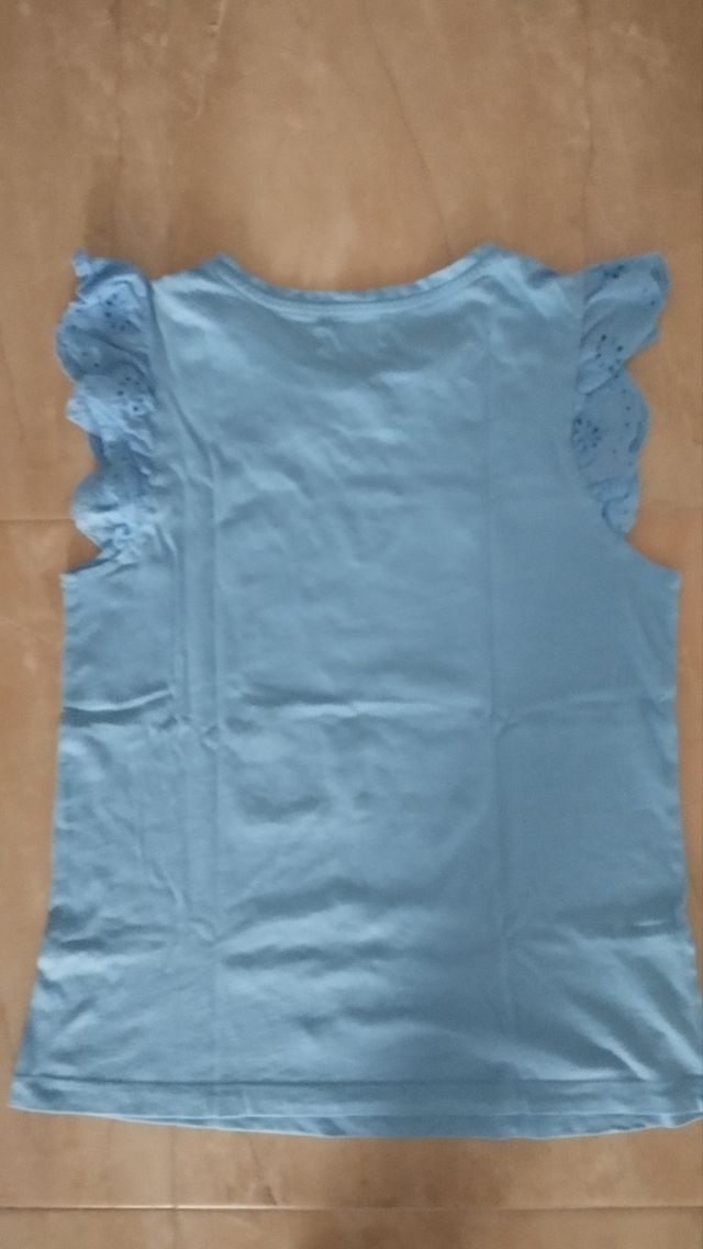 Camiseta sin mangas volantes