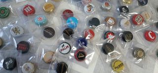 100 Chapas diferentes en buen estado