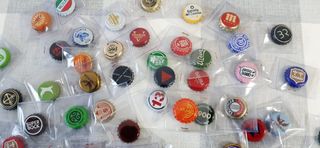 100 Chapas diferentes en buen estado