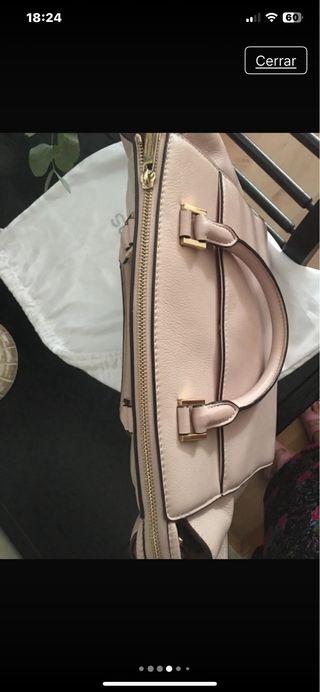 Bolso color rosa claro