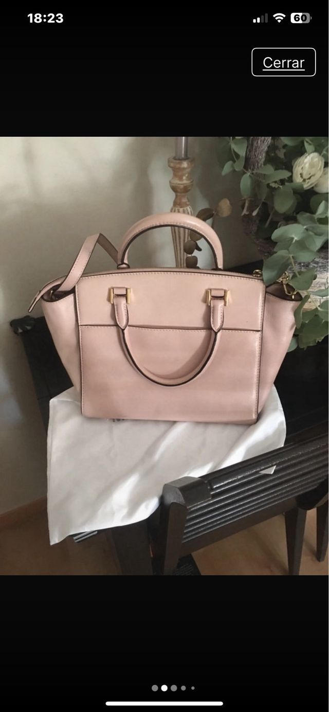 Bolso color rosa claro