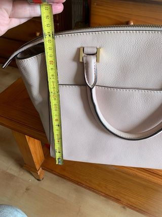 Bolso color rosa claro