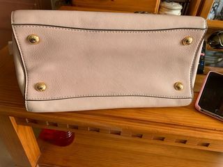 Bolso color rosa claro