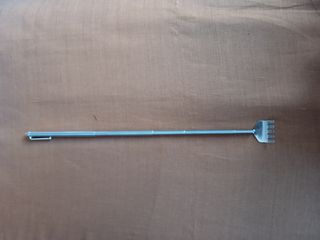 Rascador para espalda