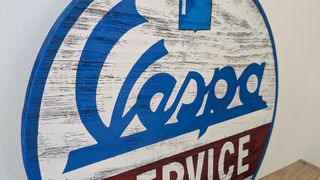 Cartel logo Vespa Service