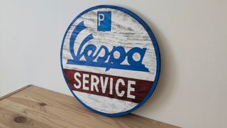 Cartel logo Vespa Service