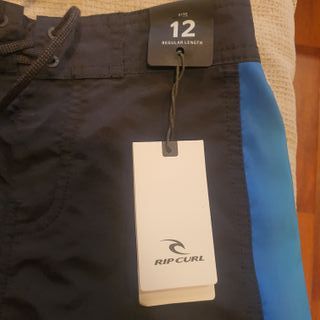 BAÑADOR NIÑO MARCA RIP CURL AZUL MARINO TALLA 12