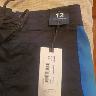 BAÑADOR NIÑO MARCA RIP CURL AZUL MARINO TALLA 12