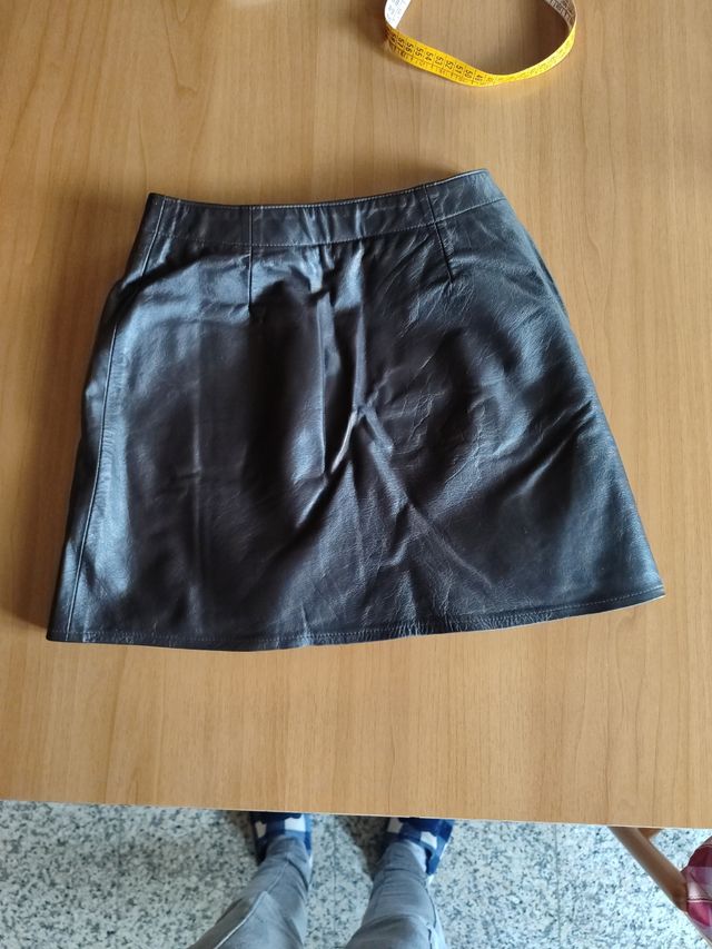 Minigonna in pelle nuova, a portafoglio