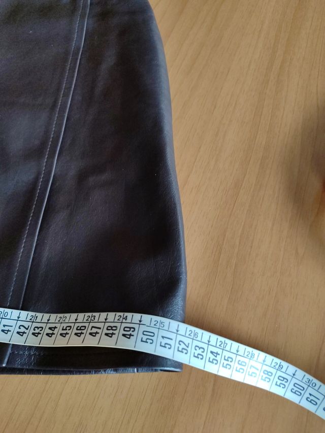 Minigonna in pelle nuova, a portafoglio