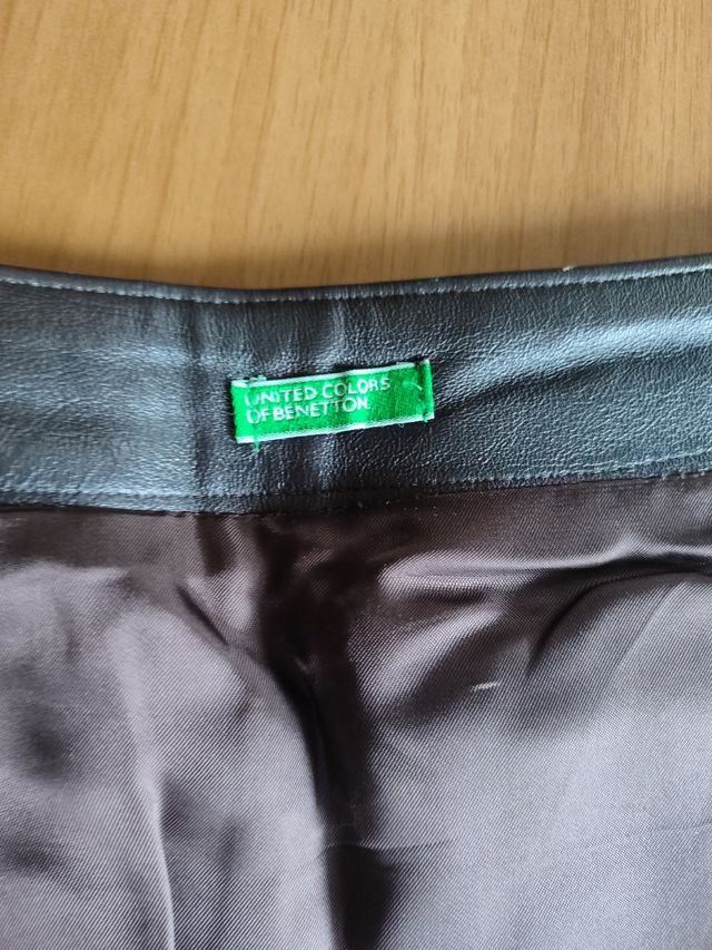 Minigonna in pelle nuova, a portafoglio