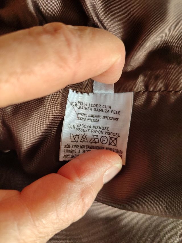 Minigonna in pelle nuova, a portafoglio